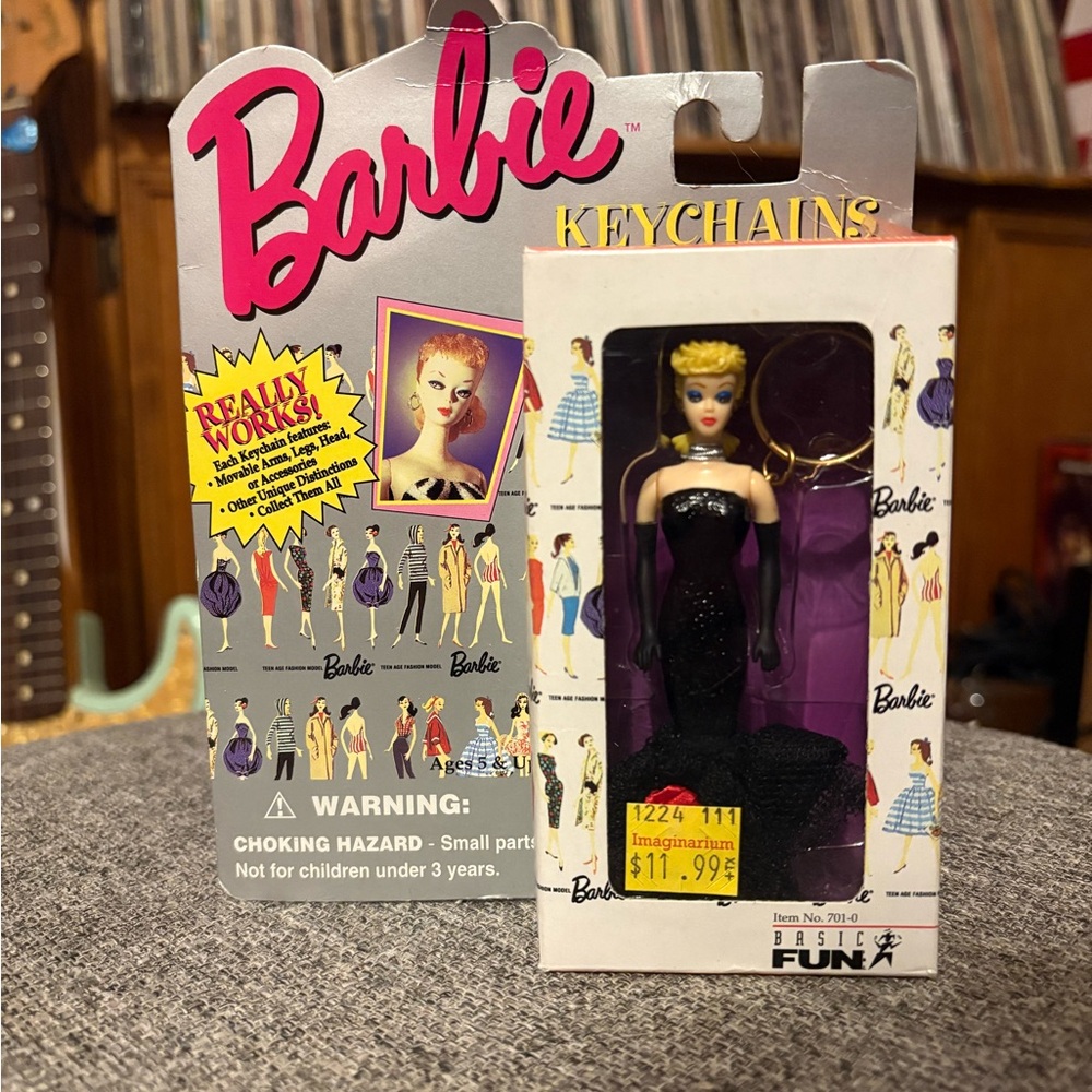 Barbie with moveable arms keychain
